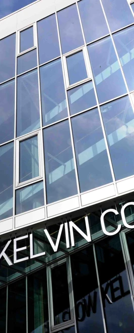 Close-up of Glasgow Kelvin College Springburn Campus entrance, highlighting the building’s modern design and glass-panelled exterior. Close-up of Glasgow Kelvin College Springburn Campus entrance, highlighting the building’s modern design and glass-panelled exterior.